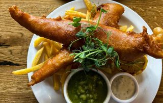 a plate of tankerville fish and chips